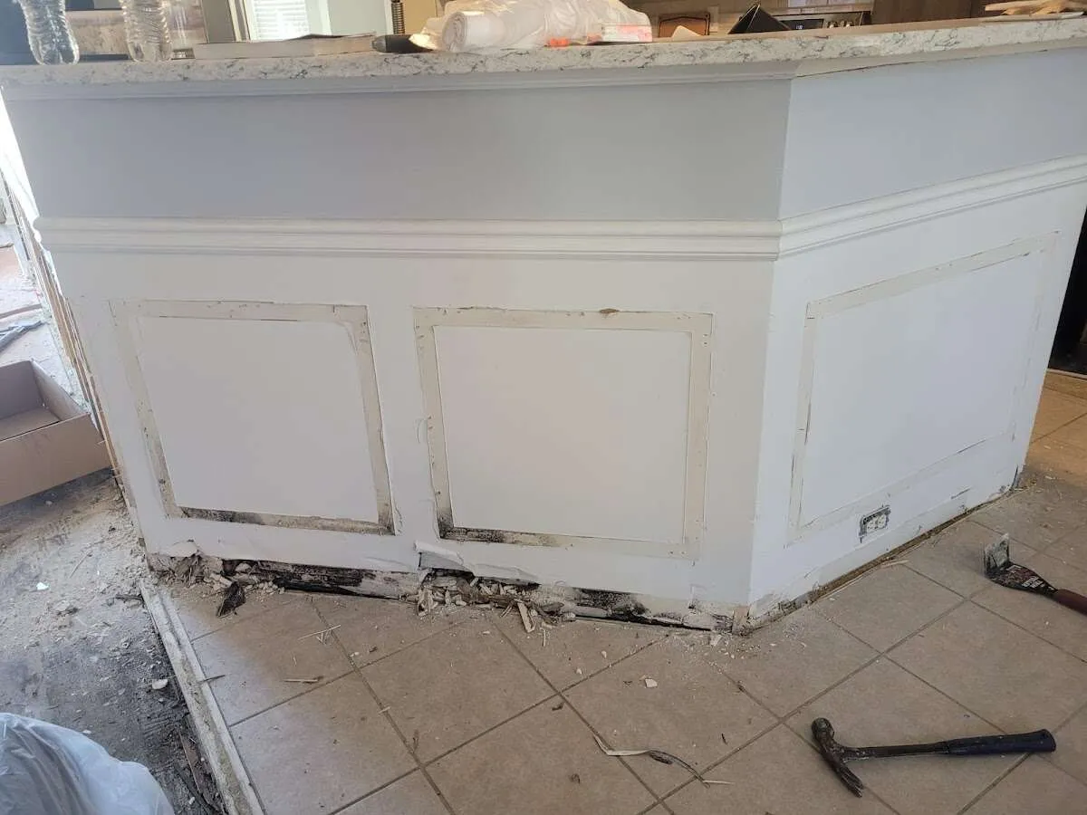 Water damage and mold on kitchen during Storm Damage Restoration in Indianola